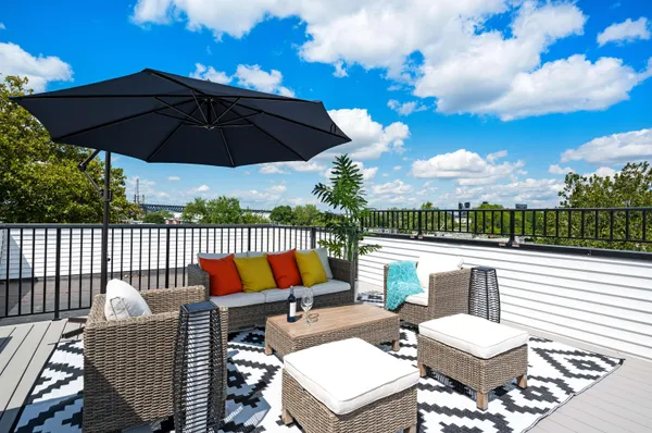 a view of a patio on the roof deck