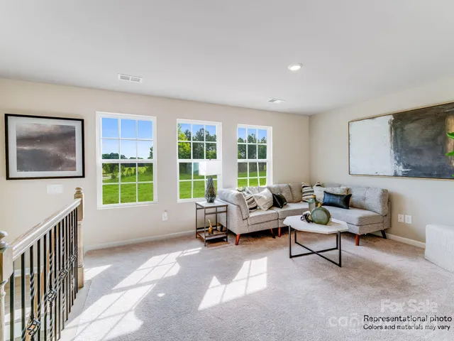 a living room with furniture and a couch