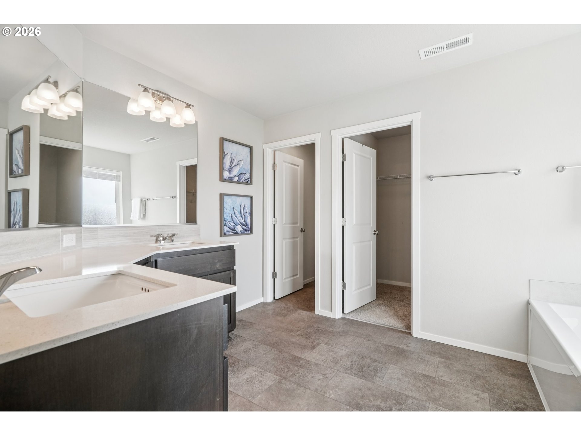 1712 Northeast Pioneer Lane Camas, WA 98607 - Photo 14 of 25 a bathroom with a sink vanity and a mirror