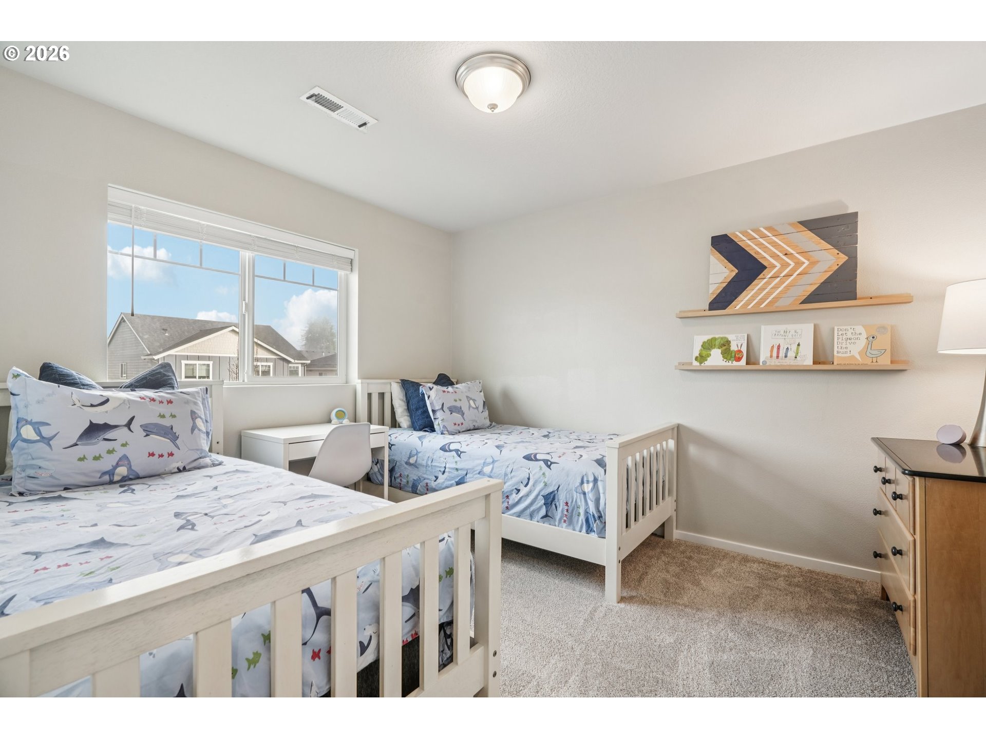 1712 Northeast Pioneer Lane Camas, WA 98607 - Photo 21 of 25 a bedroom with two beds and a dresser