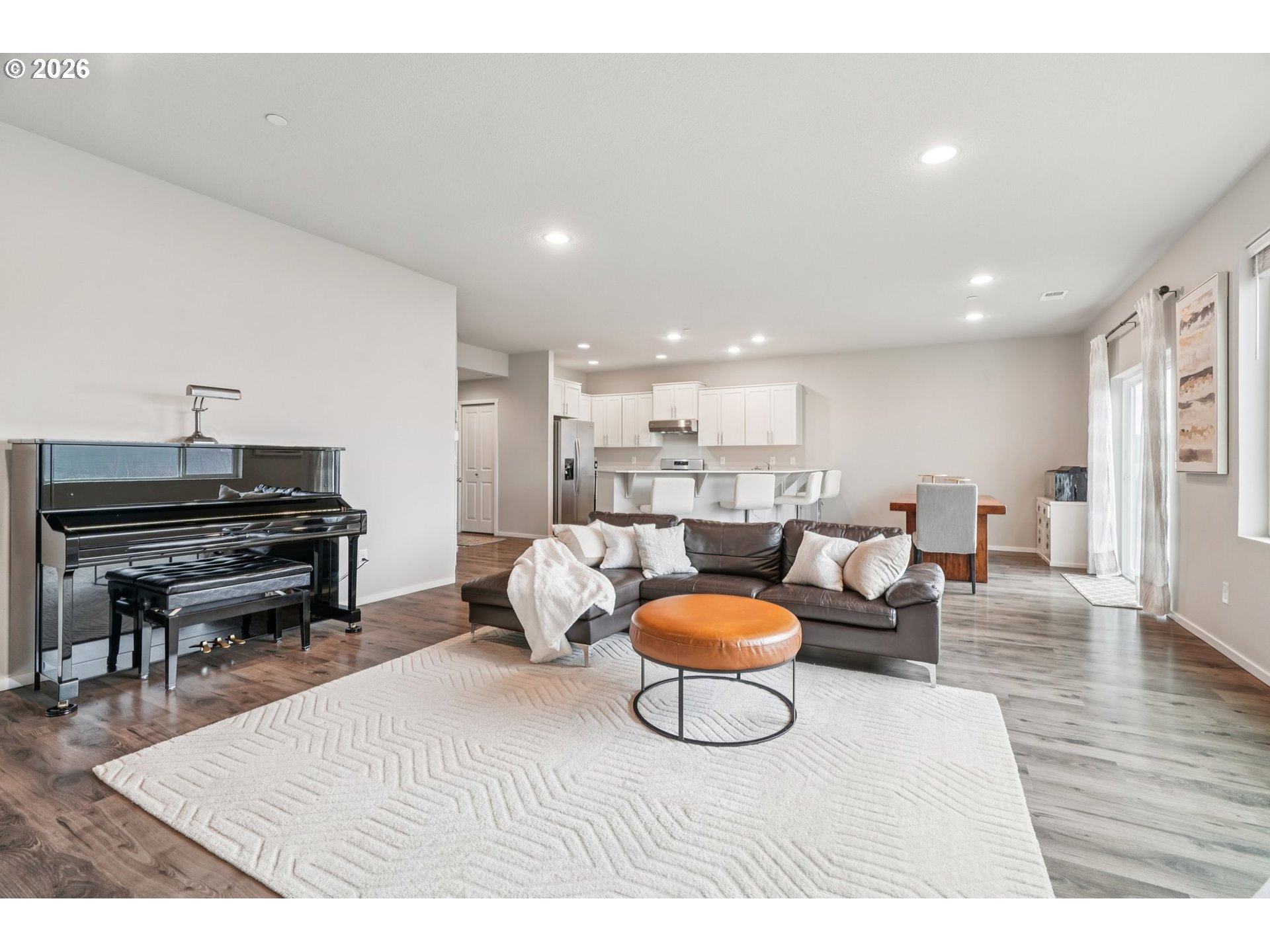 1712 Northeast Pioneer Lane Camas, WA 98607 - Photo 6 of 25 a living room with furniture and a piano