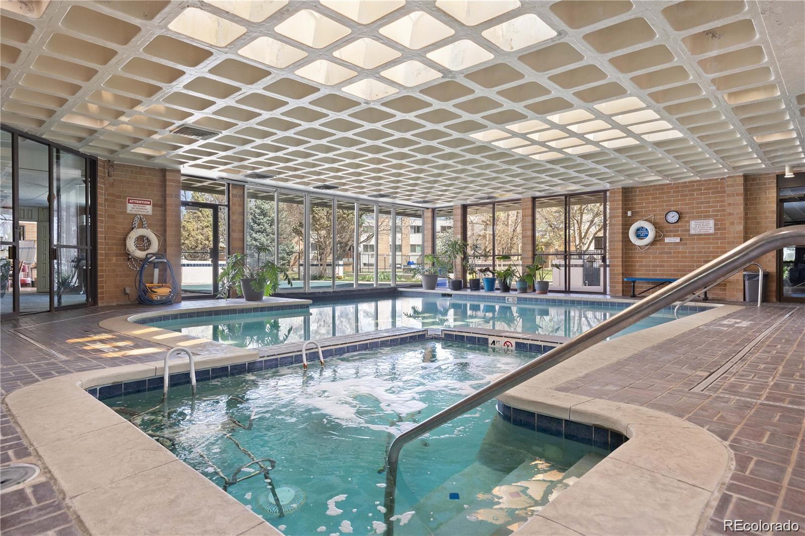 2880 South Locust Street, Unit 507S Denver, CO 80222 - Photo 41 of 48 a view of swimming pool with outdoor seating