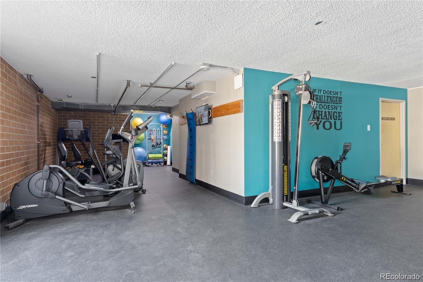 2880 South Locust Street, Unit 507S Denver, CO 80222 - Photo 45 of 48 a view of a room with gym equipment