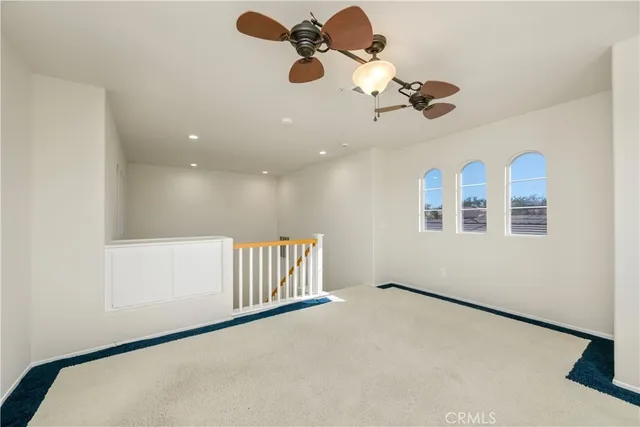 a front view of a house with a large window