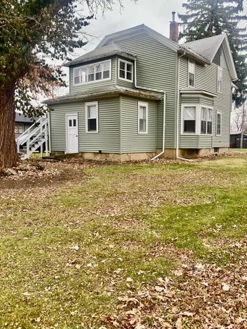 a house view with a garden space