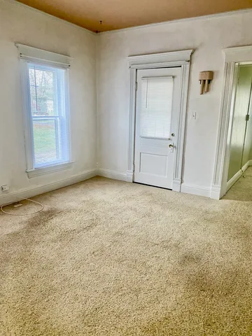 an empty room with windows