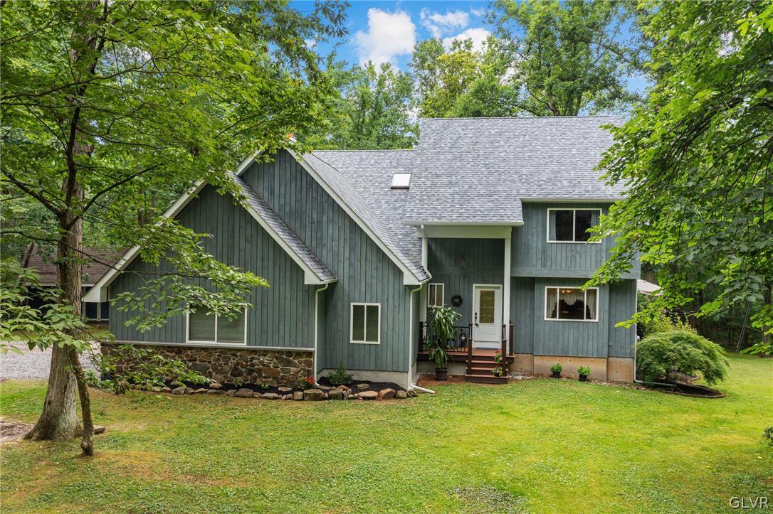 3220 Winding Road Kintnersville, PA 18930 - Photo 2 of 50 a view of a house with a yard balcony and sitting area