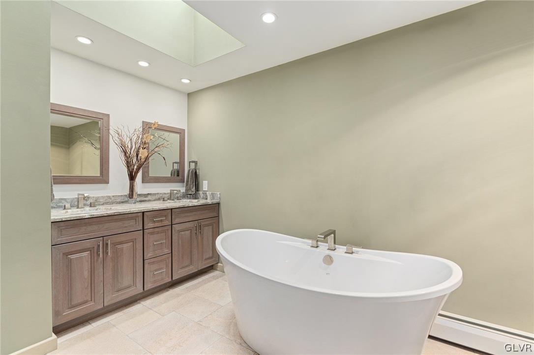 3220 Winding Road Kintnersville, PA 18930 - Photo 45 of 50 a white bath tub sitting next to a white sink
