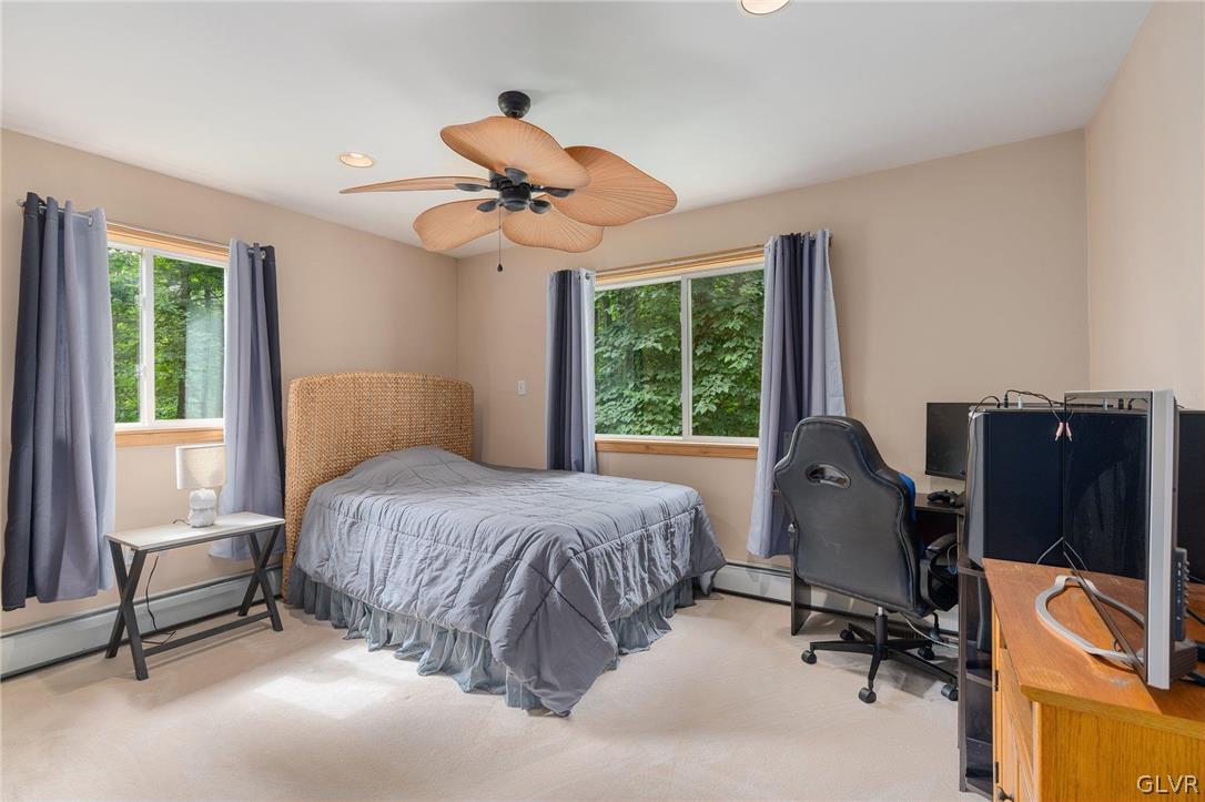 3220 Winding Road Kintnersville, PA 18930 - Photo 49 of 50 a bedroom with a bed and a desk