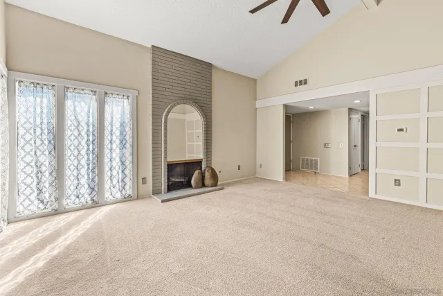 a view of a livingroom with a staircase