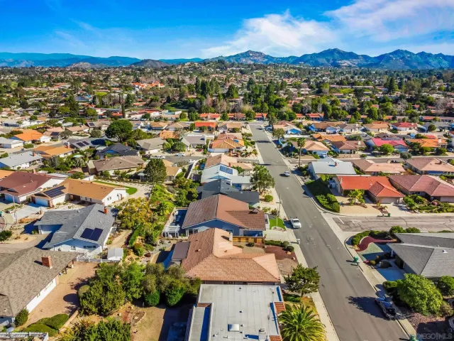 a view of a house with a garden