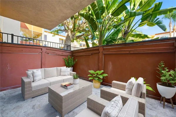 a building outdoor space with patio furniture