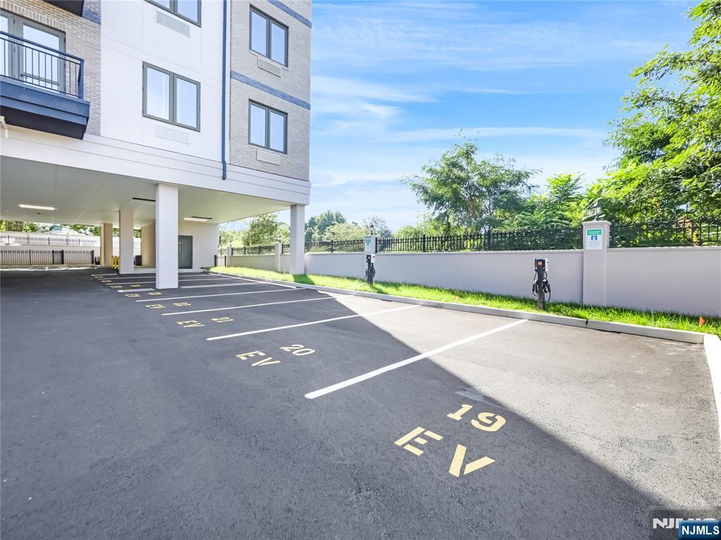 51 Queen Anne Road, Unit 207 Bogota, NJ 07603 - Photo 17 of 22 a view of a street with a building in the background