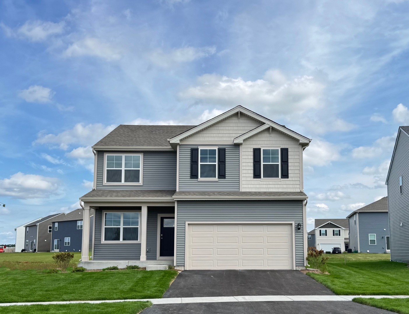 2591 Tahoe Lane Pingree Grove, IL 60140 - Photo 1 of 43 a front view of a house with a yard