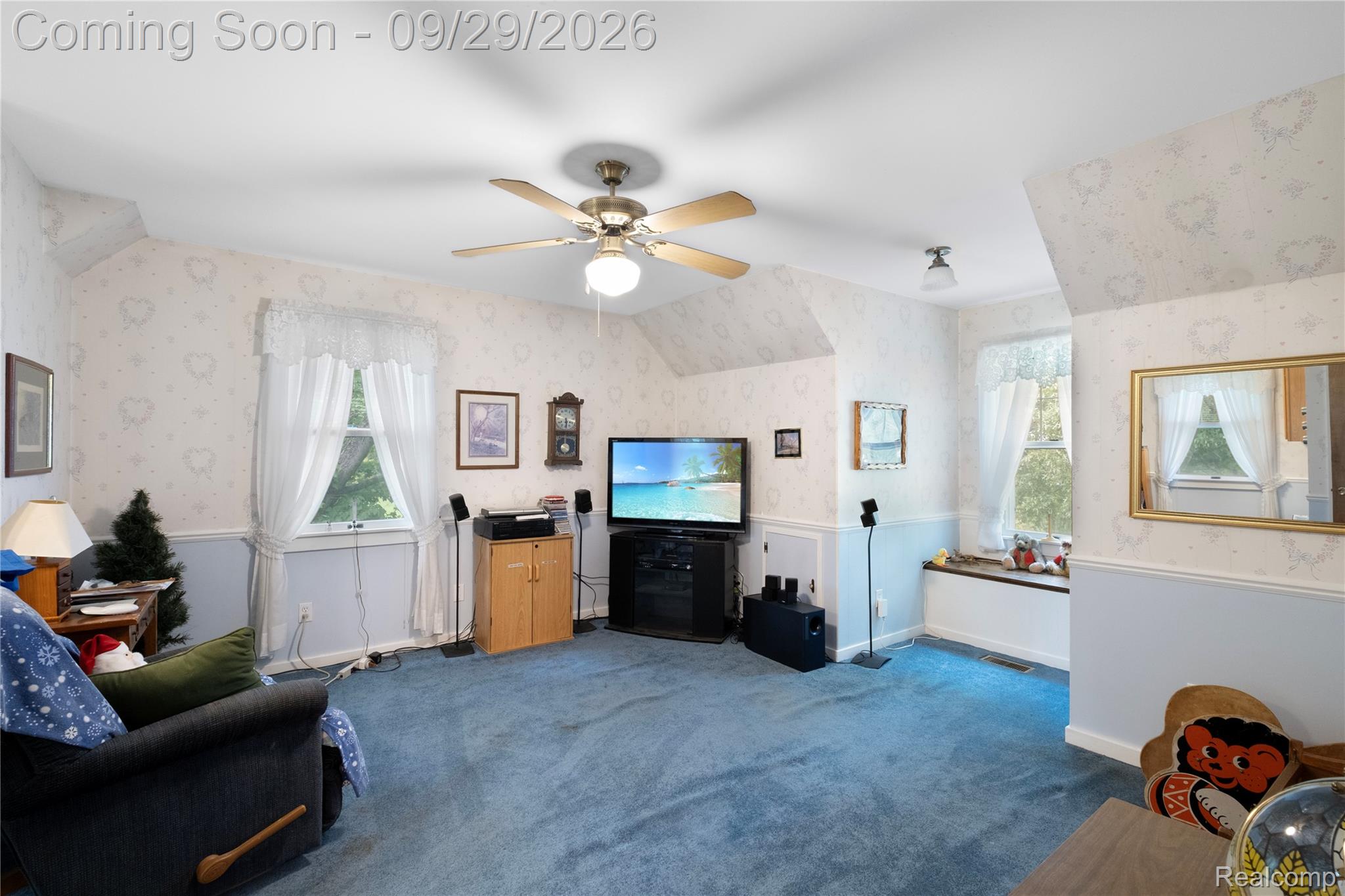 6411 Farrand Road Clio, MI 48420 - Photo 20 of 33 Sloped ceilings, patterned wallpaper, recessed window, ceiling fan, and wall-mounted light fixture