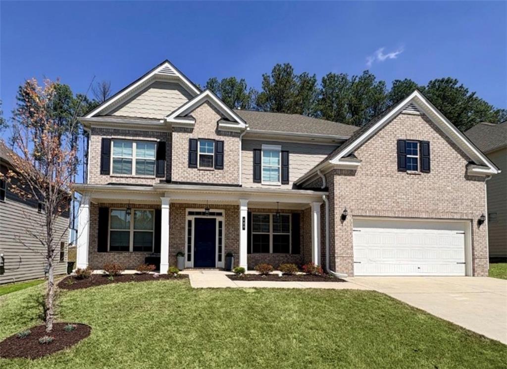 488 Victoria Heights Dr. Dallas, GA 30132 - Photo 1 of 45 front view of a house with a yard