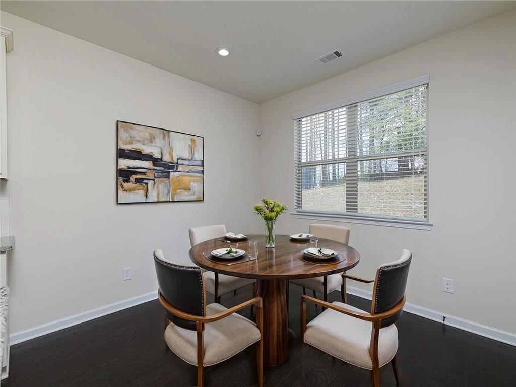488 Victoria Heights Dr. Dallas, GA 30132 - Photo 18 of 45 a dining room with furniture and window