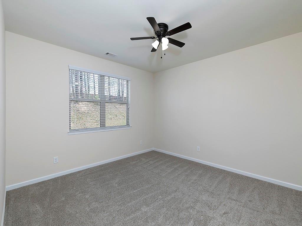 488 Victoria Heights Dr. Dallas, GA 30132 - Photo 22 of 45 an empty room with a window