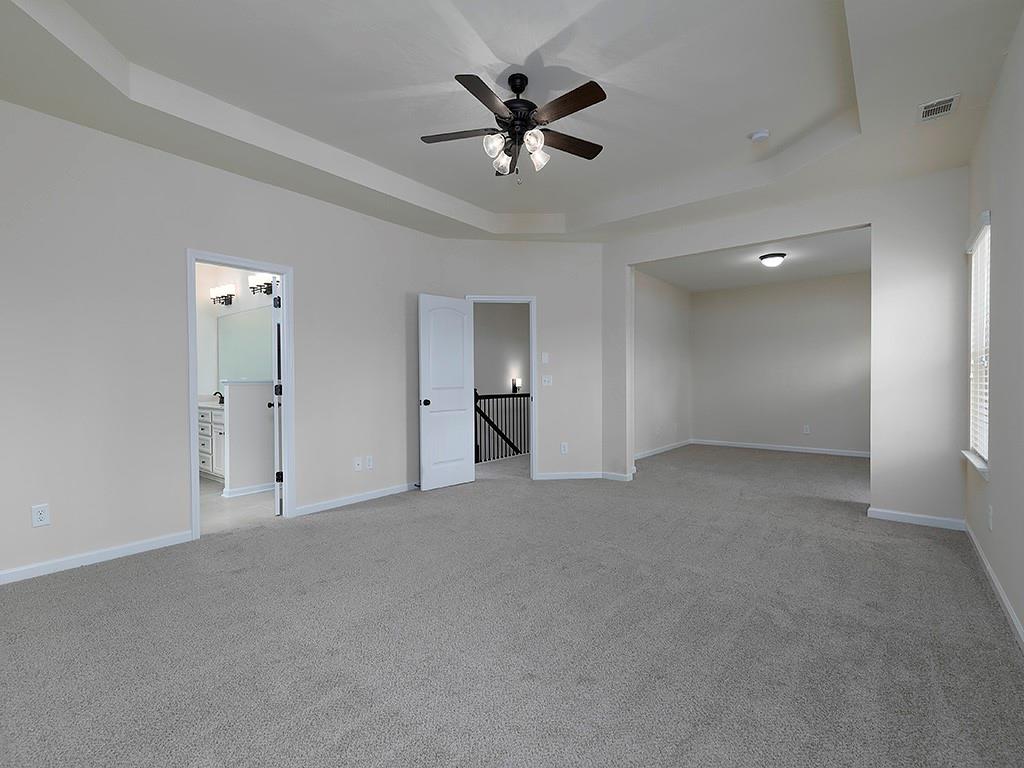 488 Victoria Heights Dr. Dallas, GA 30132 - Photo 26 of 45 a view of an empty room with a ceiling fan
