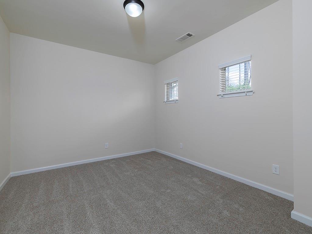 488 Victoria Heights Dr. Dallas, GA 30132 - Photo 28 of 45 an empty room with windows
