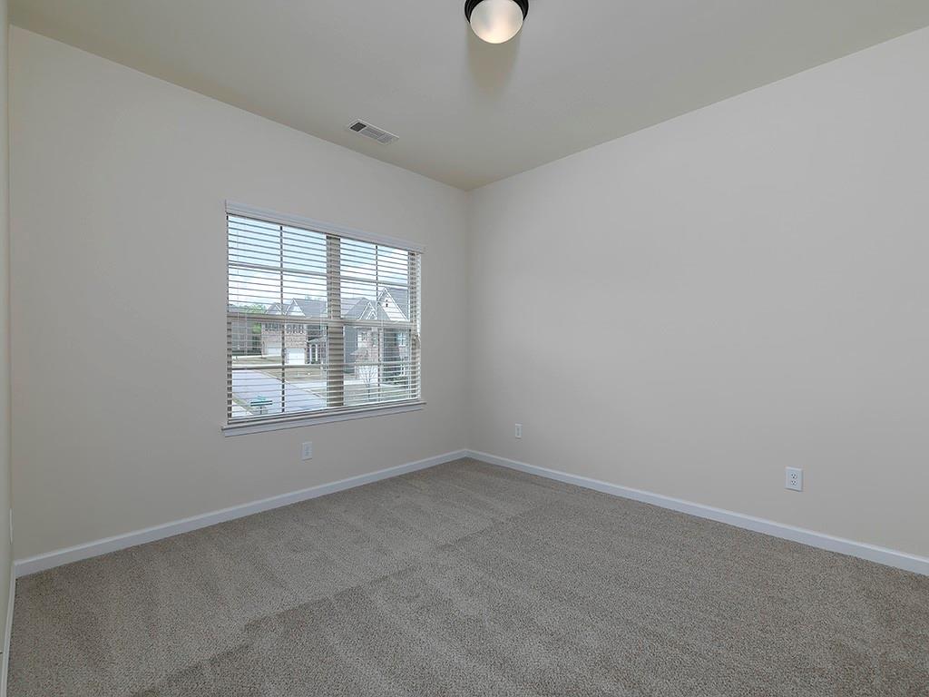 488 Victoria Heights Dr. Dallas, GA 30132 - Photo 34 of 45 an empty room with windows