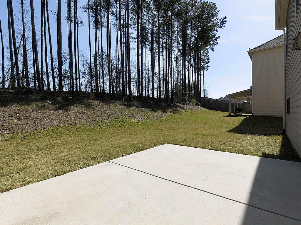 488 Victoria Heights Dr. Dallas, GA 30132 - Photo 41 of 45 a view of a backyard with wooden fence