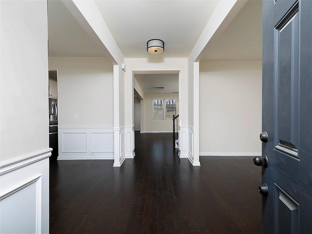 488 Victoria Heights Dr. Dallas, GA 30132 - Photo 8 of 45 a view of a hallway with wooden floor