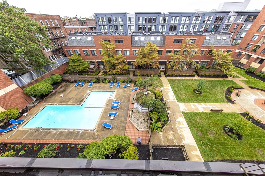 85 Brainerd Road, Unit 503 Boston, MA 02134 - Photo 19 of 21 an aerial view of multiple houses with yard