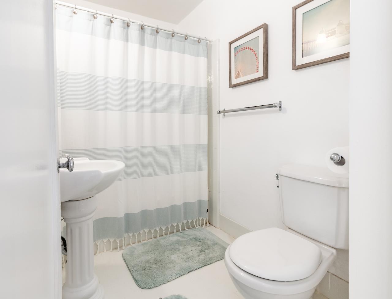 2891 Scriver Street Santa Cruz, CA 95062 - Photo 16 of 30 a bathroom with a toilet and a shower