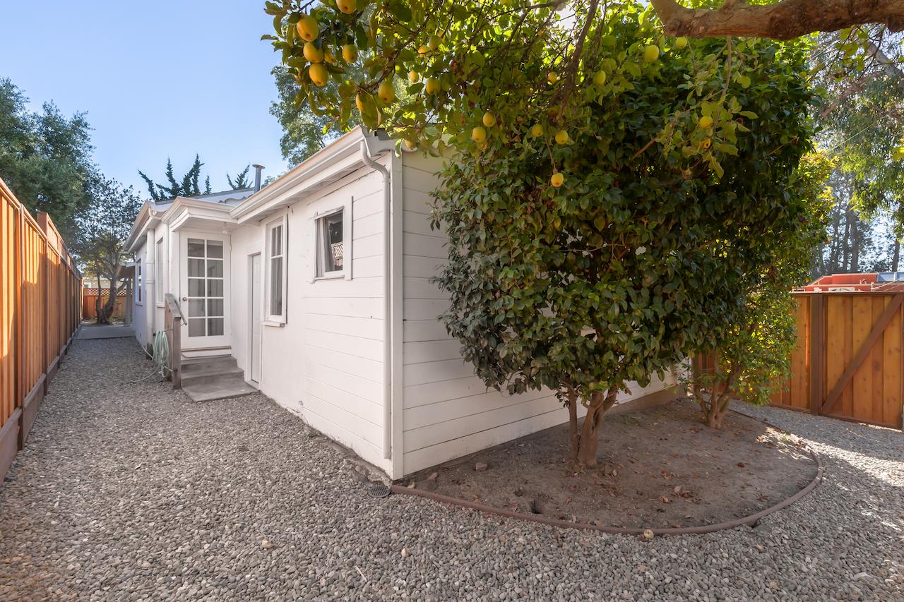 2891 Scriver Street Santa Cruz, CA 95062 - Photo 24 of 30 a view of a house with a yard and garage