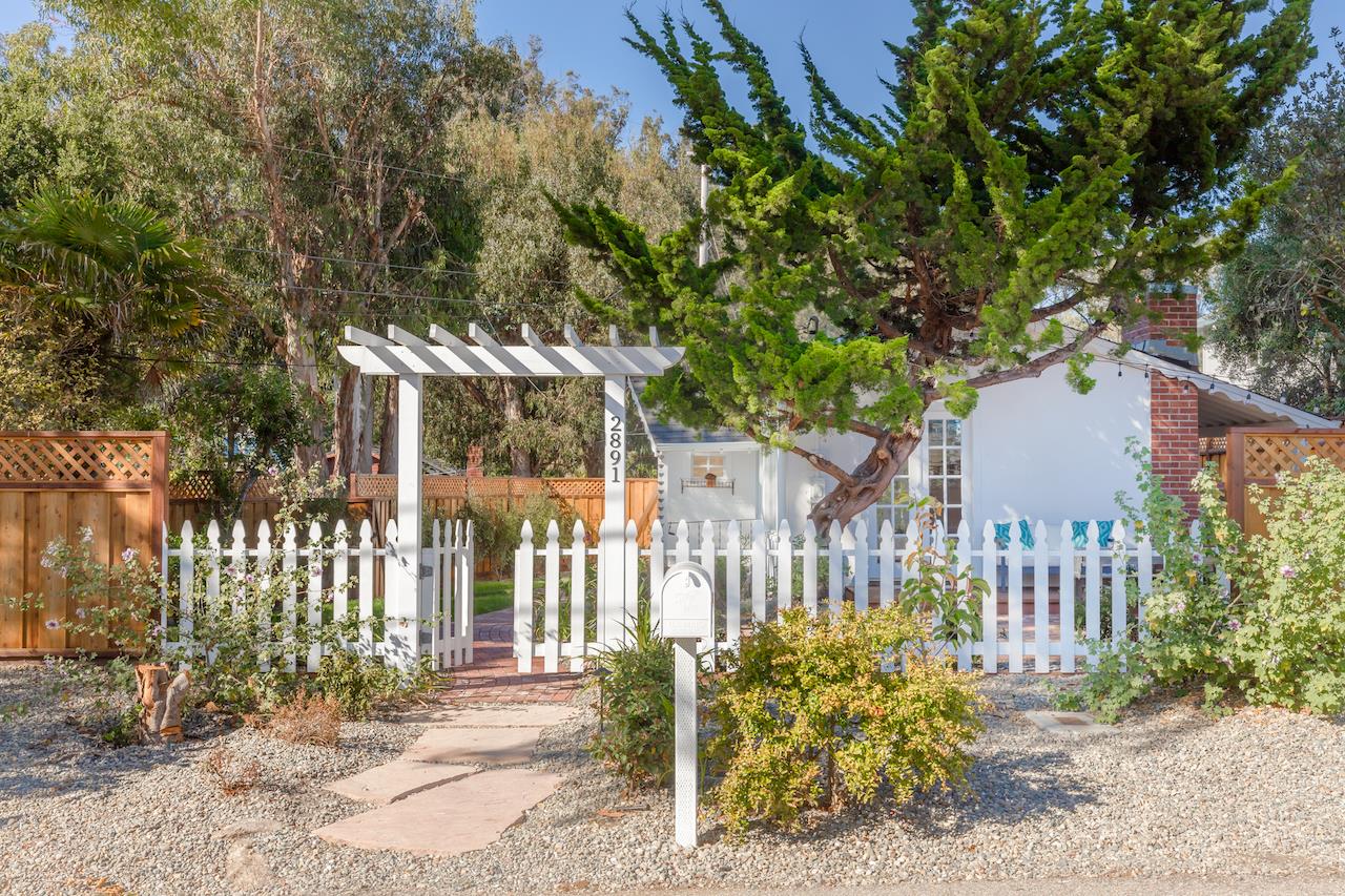 2891 Scriver Street Santa Cruz, CA 95062 - Photo 29 of 30 a view of a house with a small yard and wooden fence