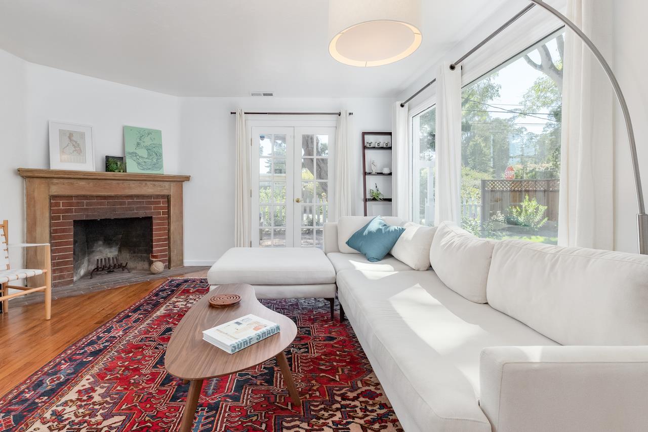2891 Scriver Street Santa Cruz, CA 95062 - Photo 5 of 30 a living room with furniture and a fireplace