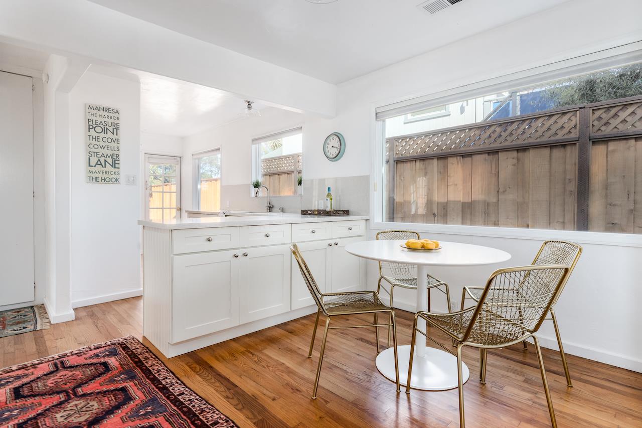 2891 Scriver Street Santa Cruz, CA 95062 - Photo 9 of 30 a view of a dining room with furniture and wooden floor