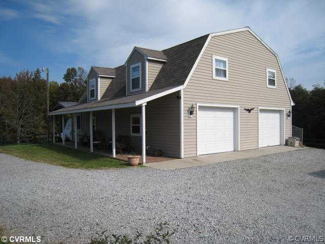 22987 Prince Edward Highway Rice, VA 23966 - Photo 3 of 10 a view of a house with a yard and garden