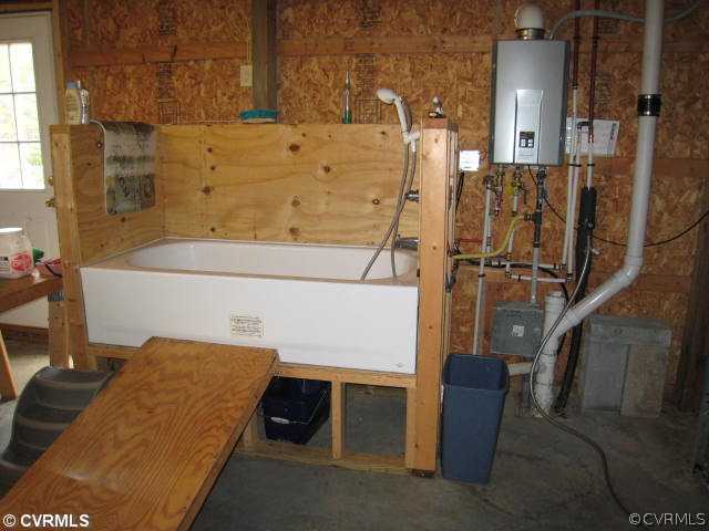 22987 Prince Edward Highway Rice, VA 23966 - Photo 7 of 10 a bathroom with a bathtub and shower