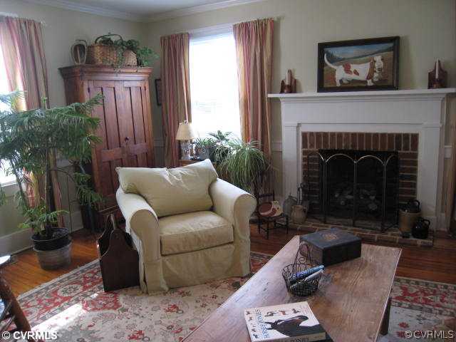 22987 Prince Edward Highway Rice, VA 23966 - Photo 8 of 10 a living room with furniture and a fireplace