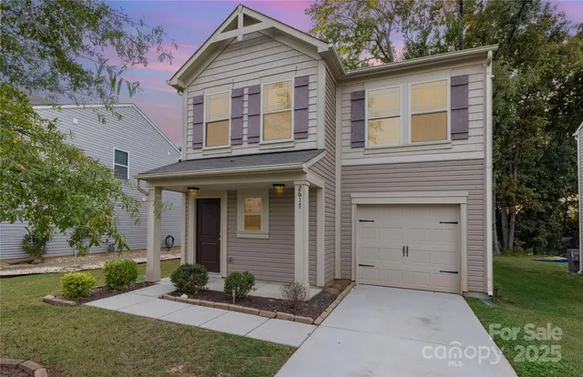 front view of a house with a yard