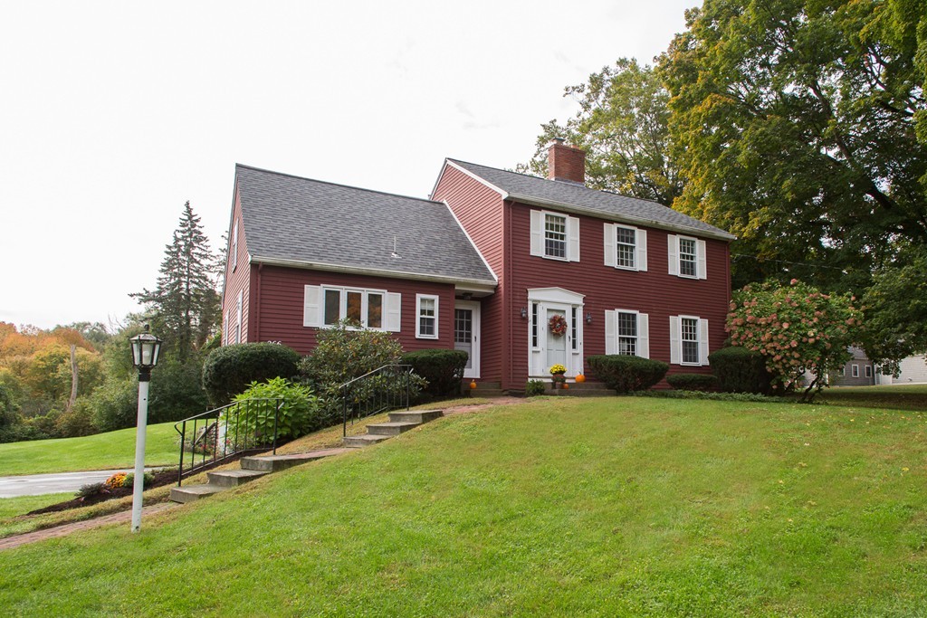 266 Pelham Island Road Wayland, MA 01778 - Photo 1 of 20 a front view of a house with a yard