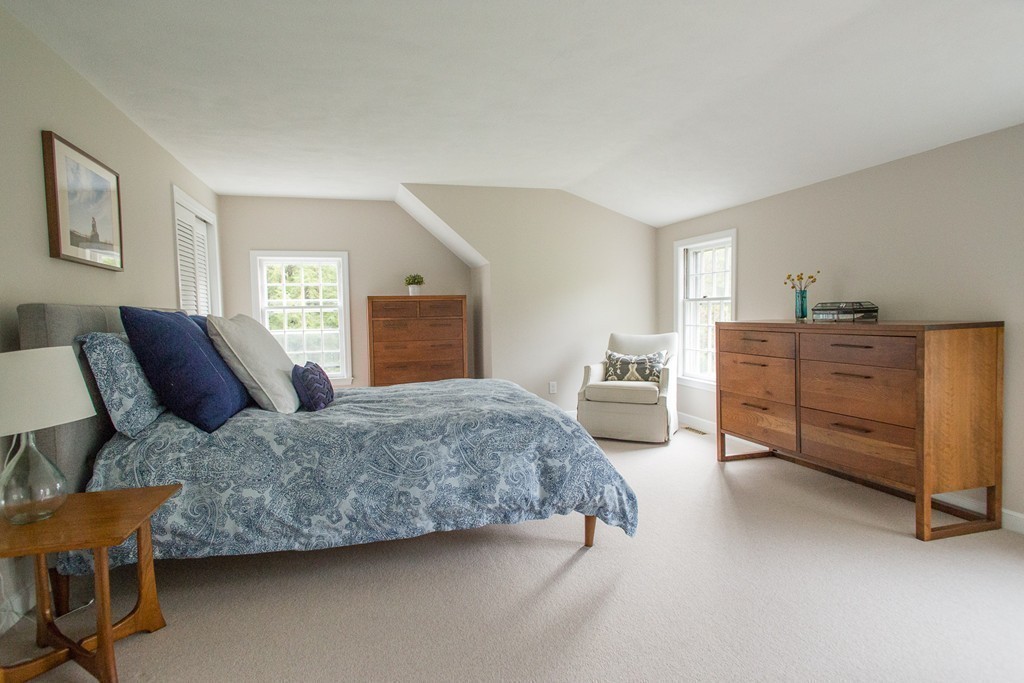 266 Pelham Island Road Wayland, MA 01778 - Photo 12 of 20 a bedroom with a bed and dresser