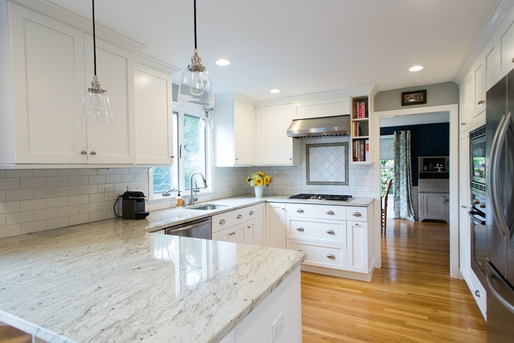 266 Pelham Island Road Wayland, MA 01778 - Photo 3 of 20 a kitchen with stainless steel appliances granite countertop a sink stove and refrigerator