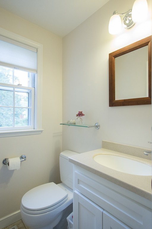 266 Pelham Island Road Wayland, MA 01778 - Photo 7 of 20 a bathroom with a toilet a sink and mirror