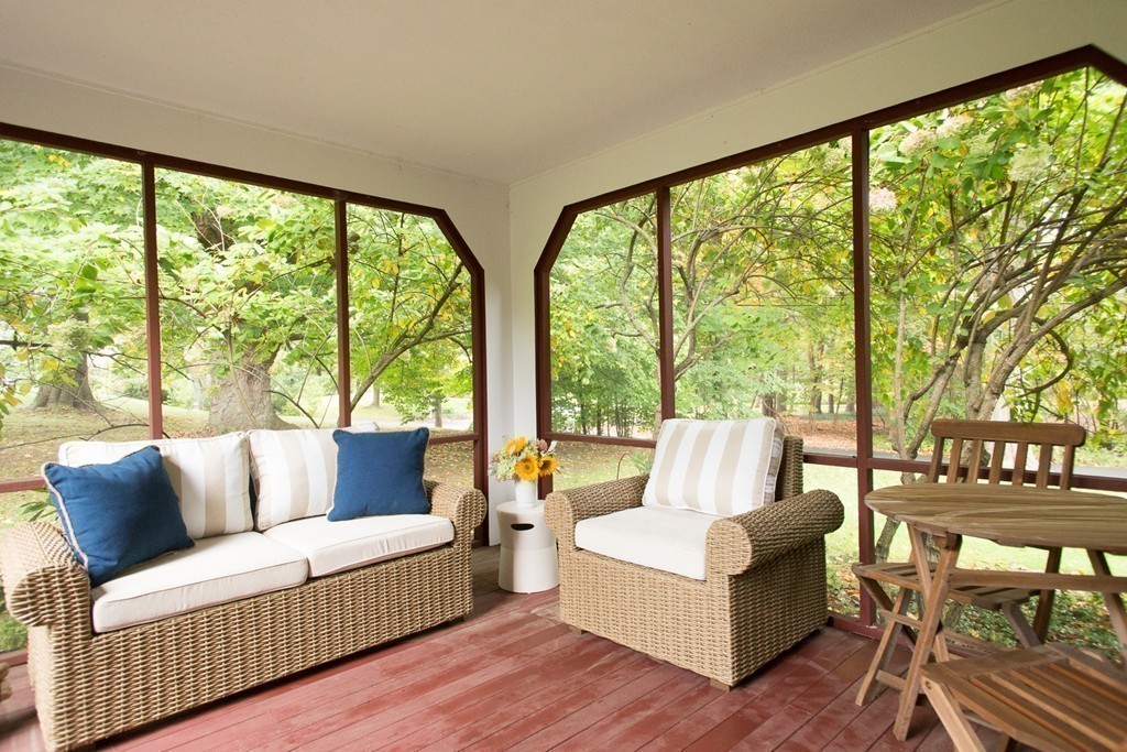 266 Pelham Island Road Wayland, MA 01778 - Photo 10 of 20 a living room with furniture and a large window