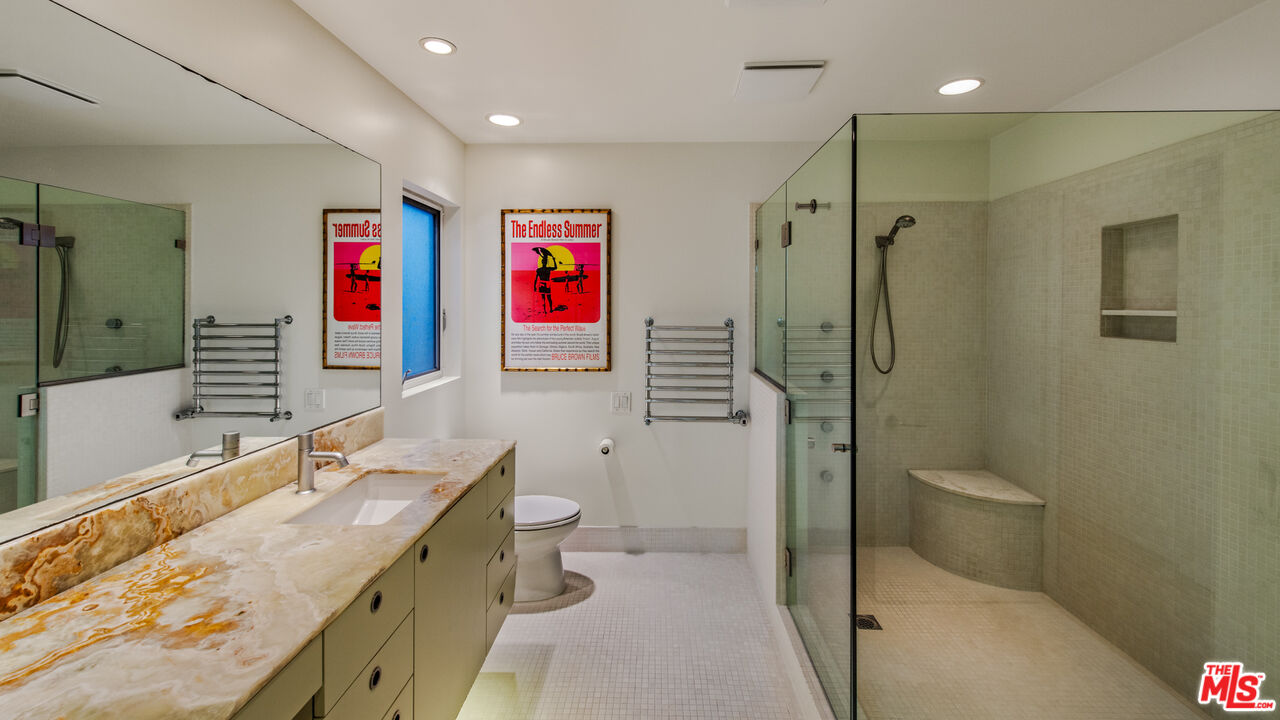 110 Topsail Mall Marina del Rey, CA 90292 - Photo 18 of 39 a bathroom with a granite countertop toilet sink and shower