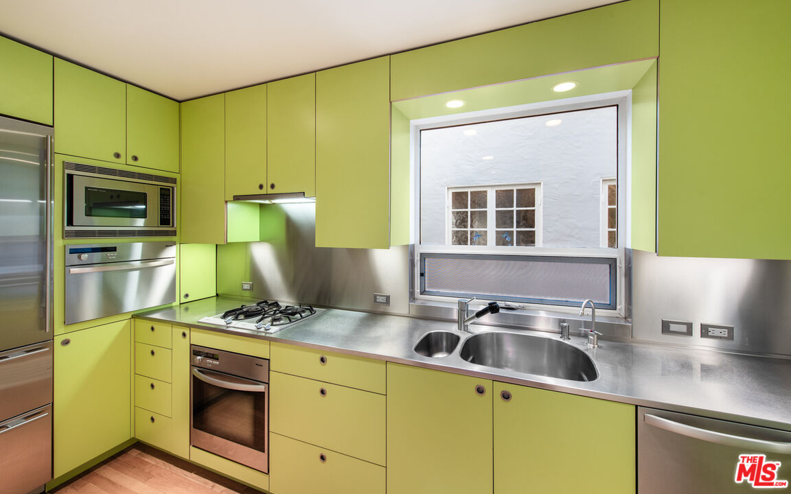 110 Topsail Mall Marina del Rey, CA 90292 - Photo 7 of 39 a kitchen with a sink cabinets and stainless steel appliances