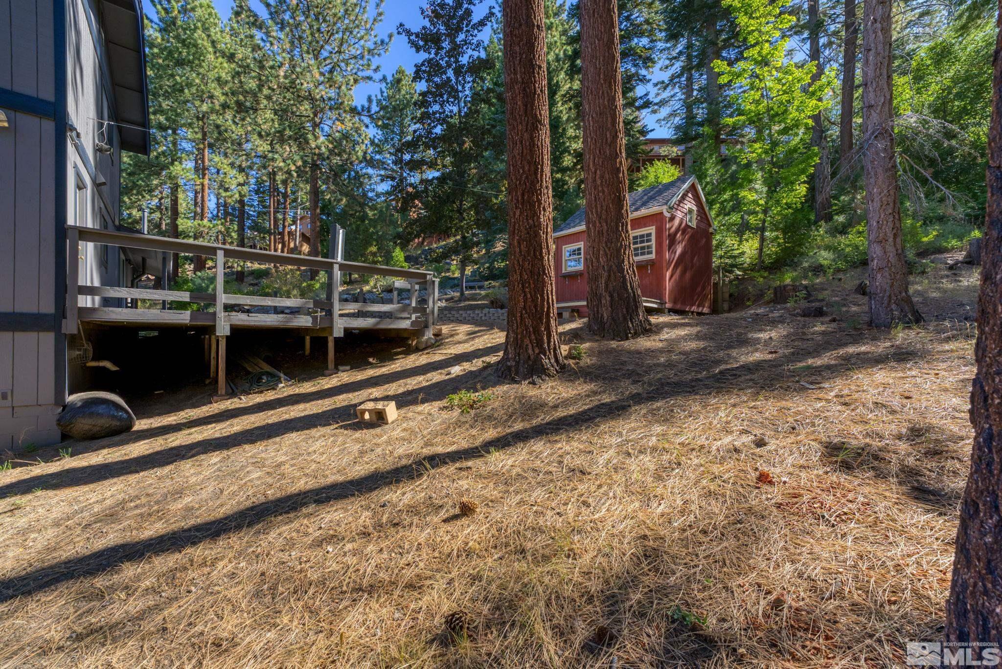 213 Chimney Rock Road Stateline, NV 89449 - Photo 33 of 37 a view of a backyard with a fence