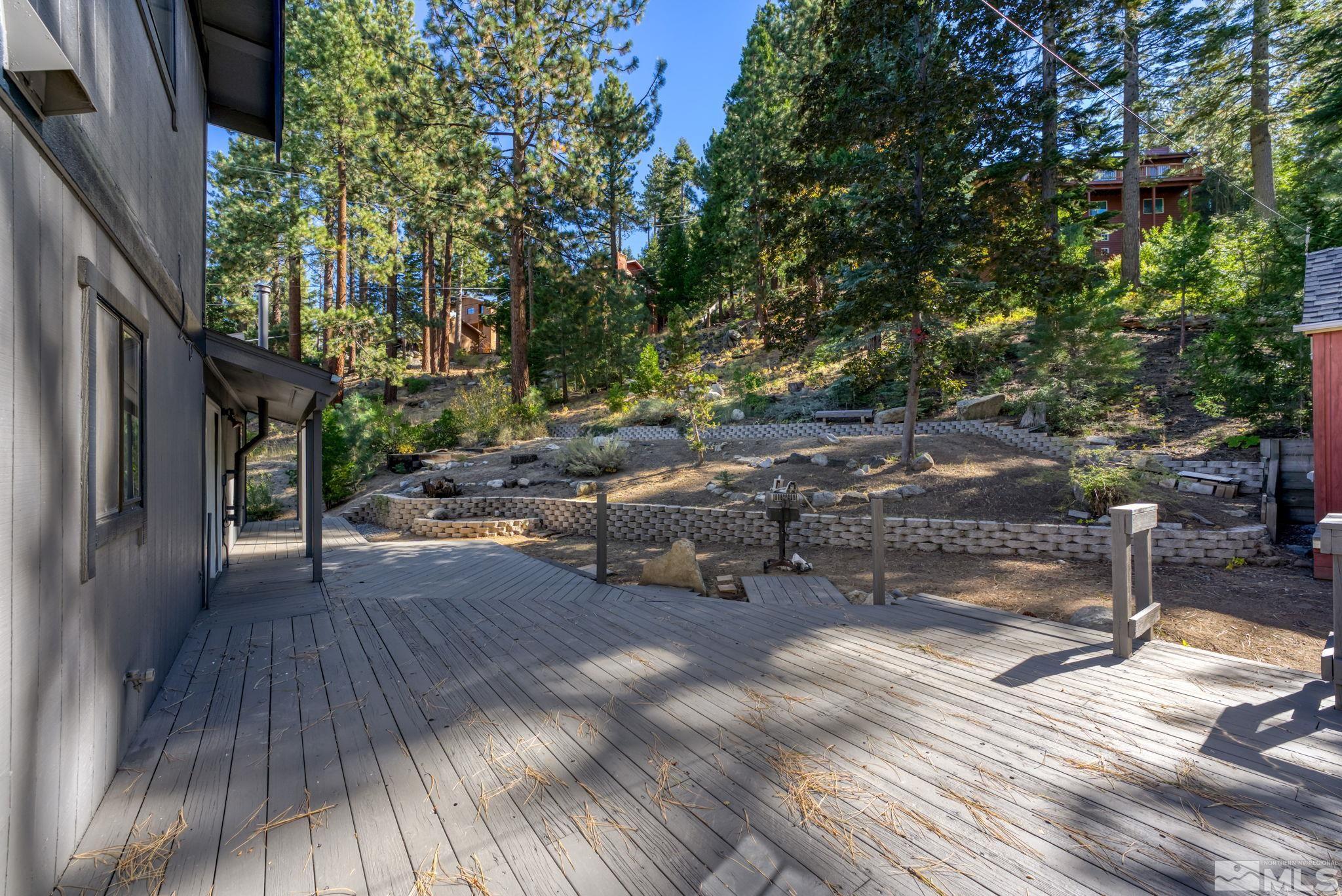 213 Chimney Rock Road Stateline, NV 89449 - Photo 8 of 37 a view of a backyard with sitting area
