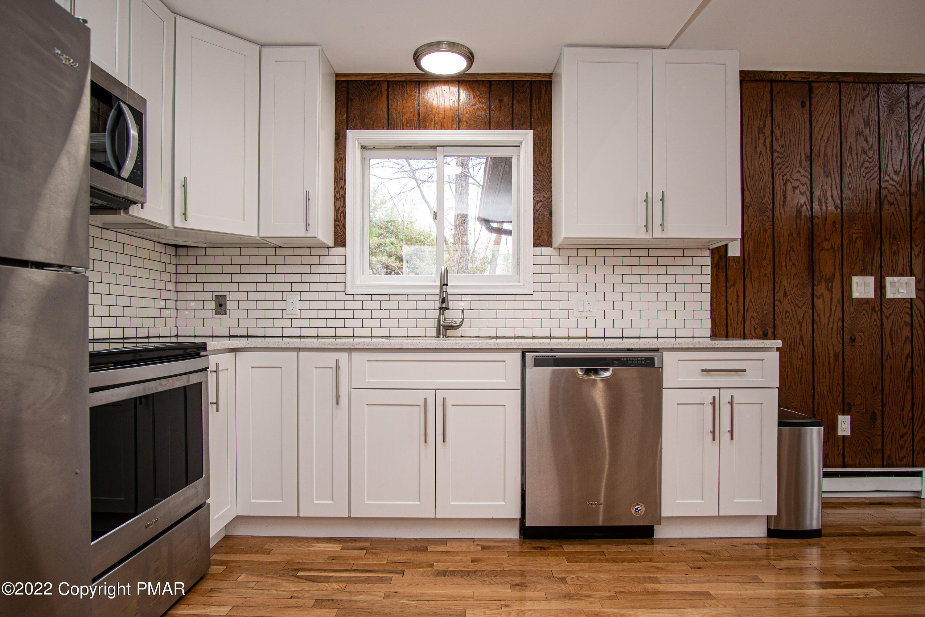 125 Edinburgh Road Bushkill, PA 18324 - Photo 11 of 64 a kitchen with stainless steel appliances granite countertop a sink a stove and cabinets