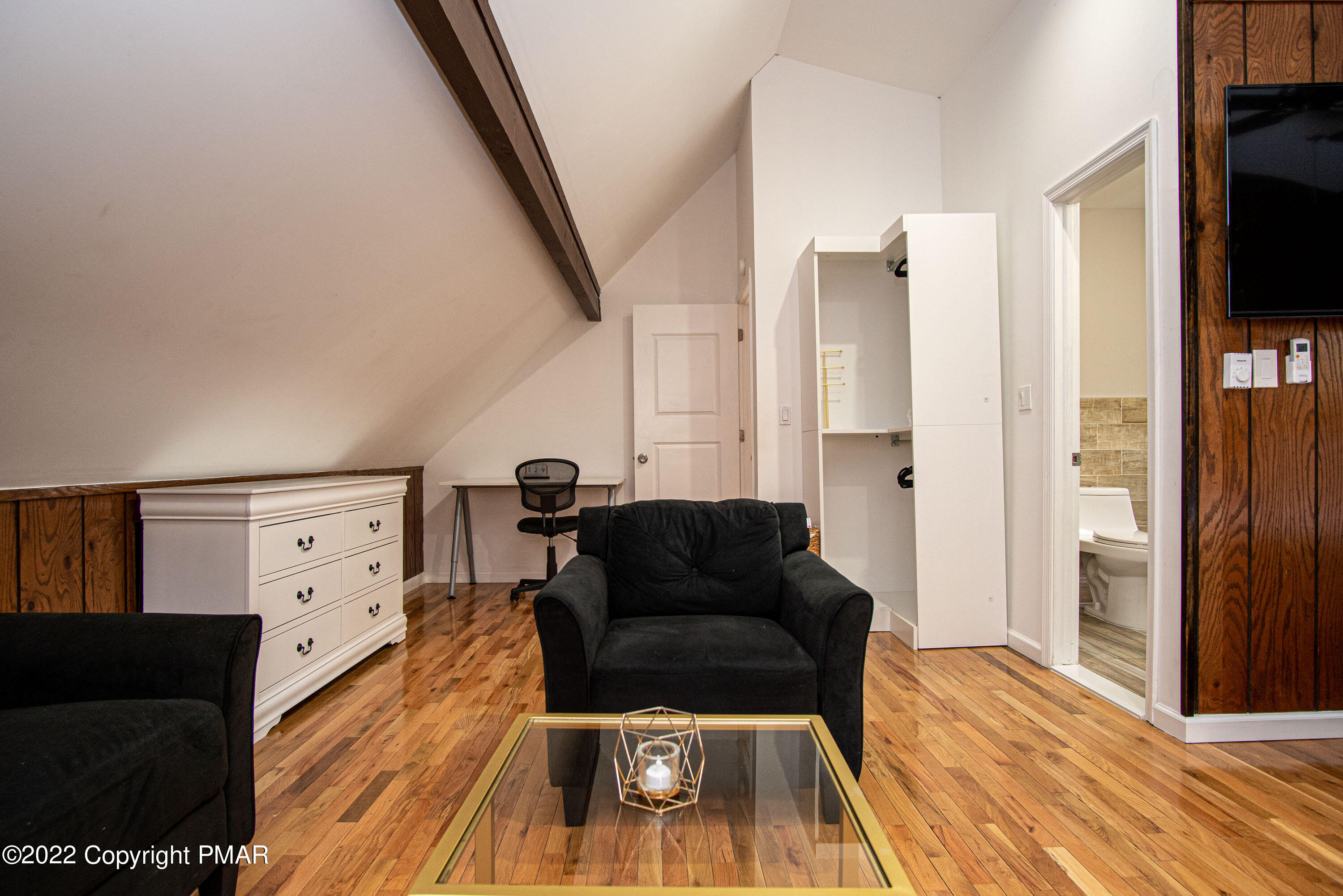 125 Edinburgh Road Bushkill, PA 18324 - Photo 26 of 64 a living room with furniture and a flat screen tv