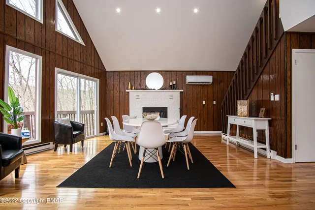 a view of a dining room with furniture window and outside view