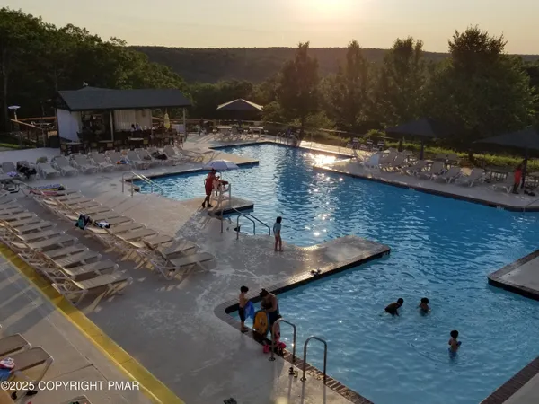 a view of swimming pool and lake view